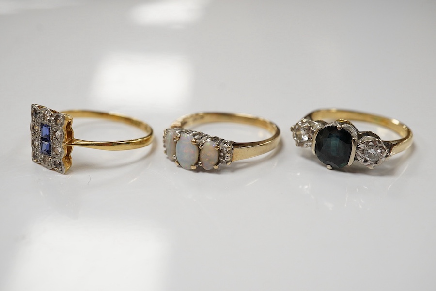 A 10k and three stone opal ring, with diamond set shoulders, an 18ct, sapphire and diamond three stone ring and a 1920's 18ct and plat. sapphire and diamond tablet ring, size P/Q, gross weight 8.1 grams Condition - poor